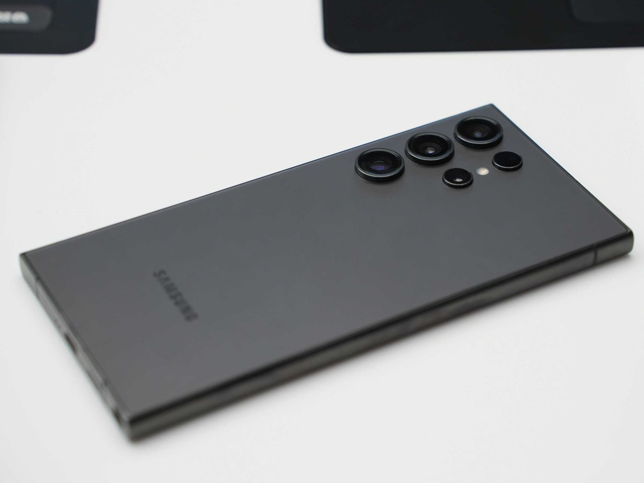 pexels photo 20348037 20348037 Detailed close-up shot of a sleek Samsung smartphone highlighting its advanced camera lenses.